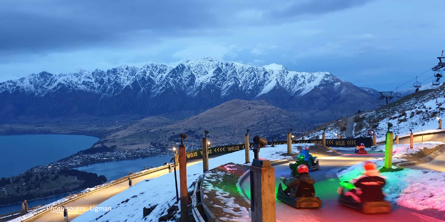 luge cart down Queenstown at night
